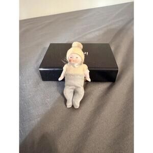 Vintage Porcelain Baby Doll with Knitted Outfit and Hat